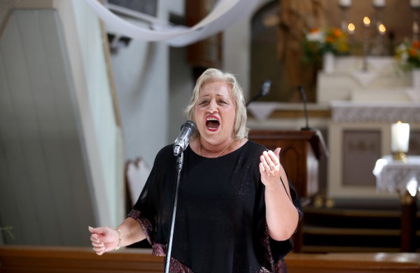 Viešniai iš Amerikos plojo pilna Skarulių bažnyčia